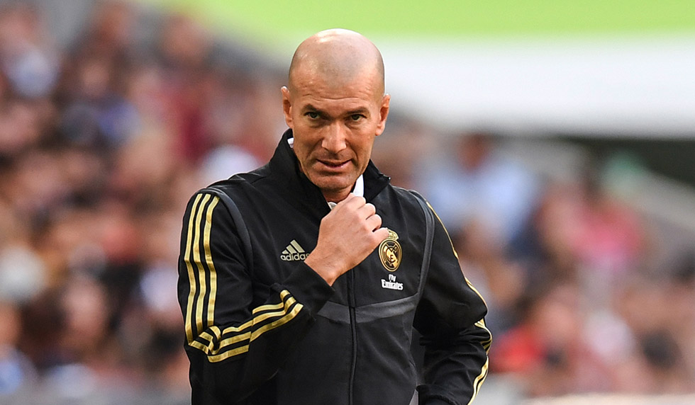 Real Madrid's French coach Zinedine Zidane looks on during the Audi Cup football match between Real Madrid and Tottenham Hotspur in Munich, on July 30, 2019. (Photo by Christof STACHE / AFP) (Photo credit should read CHRISTOF STACHE/AFP/Getty Images)