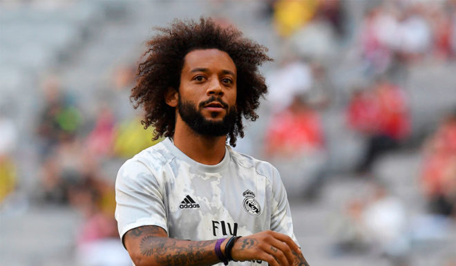 Real Madrid's Brazilian defender Marcelo warms up prior to the Audi Cup football match between Real Madrid and Tottenham Hotspur in Munich, southern Germany, on July 30, 2019. (Photo by Christof STACHE / AFP) (Photo credit should read CHRISTOF STACHE/AFP/Getty Images)