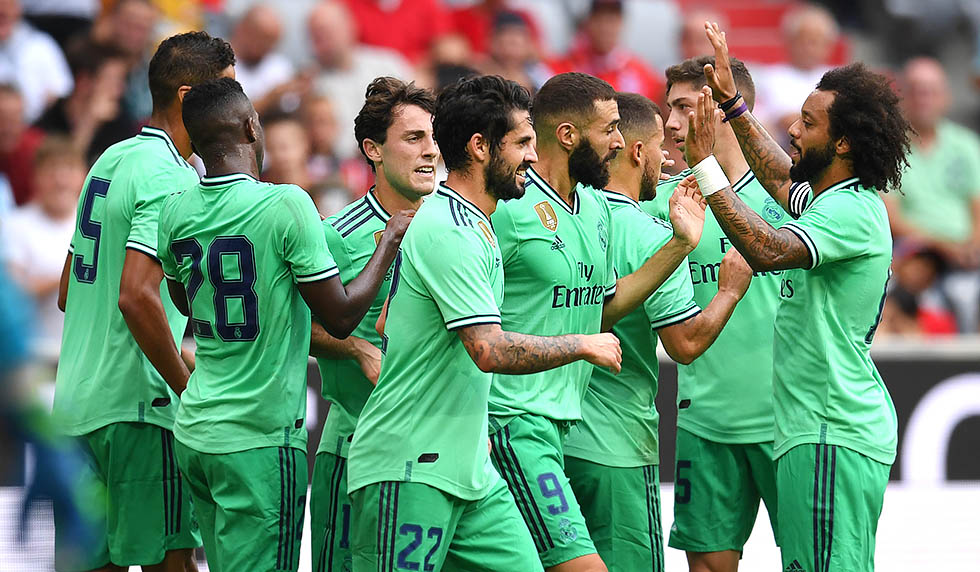 MUNICH, GERMANY - JULY 31: Karim Benzema of Real Madrid celebrates scoring his sides second goal during the Audi cup 2019 3rd place match between Real Madrid and Fenerbahce at Allianz Arena on July 31, 2019 in Munich, Germany. (Photo by Matthias Hangst/Bongarts/Getty Images)