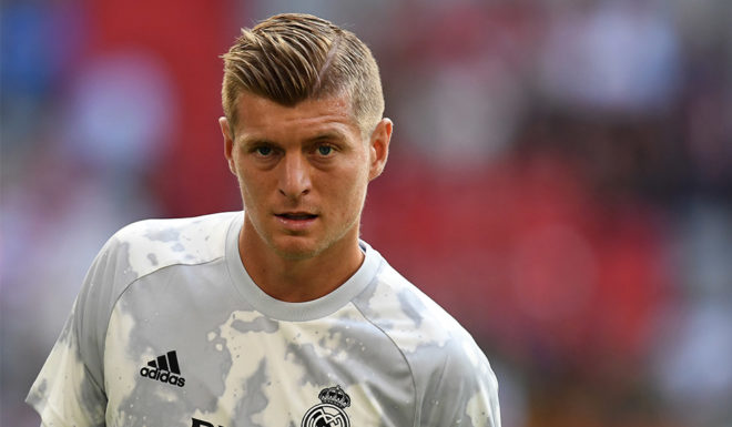 Real Madrid's German midfielder Toni Kroos warms up prior to the Audi Cup football match between Real Madrid and Tottenham Hotspur in Munich, southern Germany, on July 30, 2019. (Photo by Christof STACHE / AFP) (Photo credit should read CHRISTOF STACHE/AFP/Getty Images)
