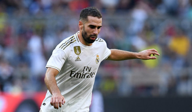 Real Madrid's Spanish defender Dani Carvajal plays the ball during the Audi Cup football match between Real Madrid and Tottenham Hotspur in Munich, southern Germany, on July 30, 2019. (Photo by Christof STACHE / AFP) (Photo credit should read CHRISTOF STACHE/AFP/Getty Images)