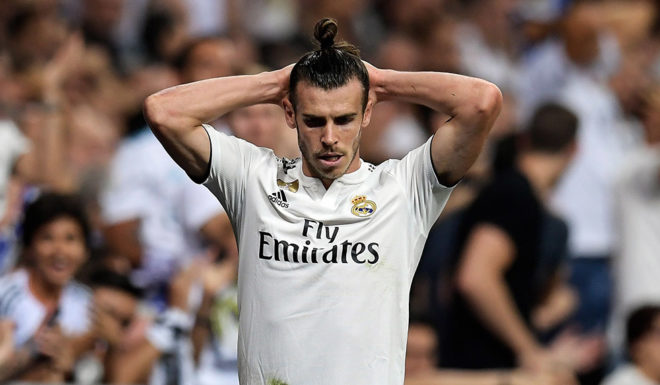 Real Madrid's Welsh forward Gareth Bale reacts during the Spanish league football match between Real Madrid CF and Club Atletico de Madrid at the Santiago Bernabeu stadium in Madrid on September 29, 2018. (Photo by OSCAR DEL POZO / AFP) (Photo credit should read OSCAR DEL POZO/AFP/Getty Images)
