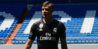 Real Madrid's new Ukrainian goalkeeper Andriy Lunin poses on the pitch during his official presentation at the Santiago Bernabeu Stadium in Madrid on July 23, 2018. (Photo by JAVIER SORIANO / AFP) (Photo credit should read JAVIER SORIANO/AFP/Getty Images)