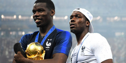 MOSCOW, RUSSIA - JULY 15: Paul Pogba of France (c) celebrates victory with mother Yeo and brother Mathias during the 2018 FIFA World Cup Final between France and Croatia at Luzhniki Stadium on July 15, 2018 in Moscow, Russia. (Photo by Shaun Botterill/Getty Images)