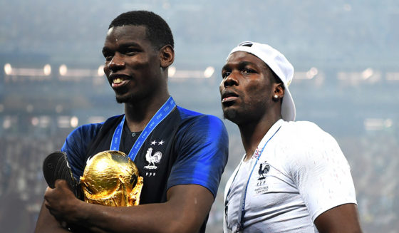 MOSCOW, RUSSIA - JULY 15: Paul Pogba of France (c) celebrates victory with mother Yeo and brother Mathias during the 2018 FIFA World Cup Final between France and Croatia at Luzhniki Stadium on July 15, 2018 in Moscow, Russia. (Photo by Shaun Botterill/Getty Images)