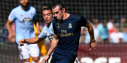 VIGO, SPAIN - AUGUST 17: David Costas of RC Celta competes for the ball with Gareth Bale of Real Madrid during the Liga match between RC Celta de Vigo and Real Madrid CF at Abanca-Balaídos on August 17, 2019 in Vigo, Spain. (Photo by Octavio Passos/Getty Images)