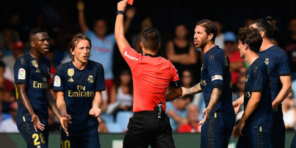 VIGO, SPAIN - AUGUST 17: Estrada Fernandez the referee shows a red card for Luka Modric of Real Madrid during the Liga match between RC Celta de Vigo and Real Madrid CF at Abanca-Balaídos on August 17, 2019 in Vigo, Spain. (Photo by Octavio Passos/Getty Images)