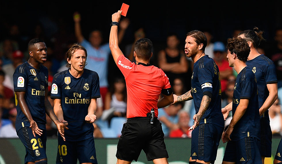 VIGO, SPAIN - AUGUST 17: Estrada Fernandez the referee shows a red card for Luka Modric of Real Madrid during the Liga match between RC Celta de Vigo and Real Madrid CF at Abanca-Balaídos on August 17, 2019 in Vigo, Spain. (Photo by Octavio Passos/Getty Images)