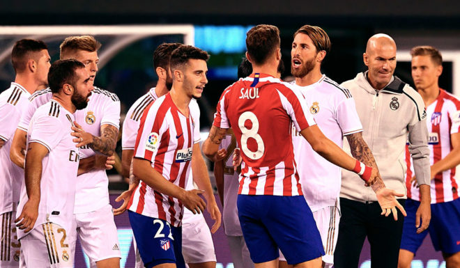 Atletico Madrid's Saul Niguez (4thR) brawls with players from Real Madrid during the 2019 International Champions Cup football match between Real Madrid and Atletico Madrid at the Metlife Stadium Arena in East Rutherford, New Jersey on July 26, 2019. (Photo by Johannes EISELE / AFP) (Photo credit should read JOHANNES EISELE/AFP/Getty Images)