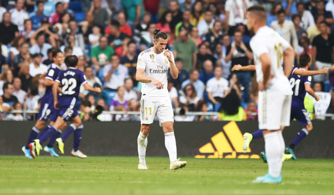 MADRID, SPAIN - AUGUST 24: Gareth Bale of Real Madrid and Karim Benzema of Real Madrid react after conceding during the La Liga match between Real Madrid CF and Real Valladolid CF at Estadio Santiago Bernabeu on August 24, 2019 in Madrid, Spain. (Photo by Denis Doyle/Getty Images)