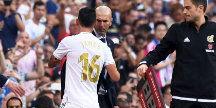 MADRID, SPAIN - AUGUST 24: James Rodriguez of Real Madrid has a word with Zinedine Zidane, Manager of Real Madrid after being substituted during the La Liga match between Real Madrid CF and Real Valladolid CF at Estadio Santiago Bernabeu on August 24, 2019 in Madrid, Spain. (Photo by Denis Doyle/Getty Images)