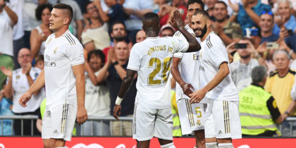 MADRID, SPAIN - AUGUST 24: Karim Benzema of Real Madrid(R) celebrates after scoring his sides first goal during the La Liga match between Real Madrid CF and Real Valladolid CF at Estadio Santiago Bernabeu on August 24, 2019 in Madrid, Spain. (Photo by Denis Doyle/Getty Images)