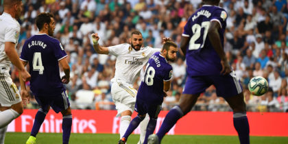 Real Madrid's French forward Karim Benzema (C) scored during the Spanish League football match between Real Madrid and Real Valladolid at the Santiago Bernabeu stadium in Madrid on August 24, 2019. (Photo by GABRIEL BOUYS / AFP) (Photo credit should read GABRIEL BOUYS/AFP/Getty Images)
