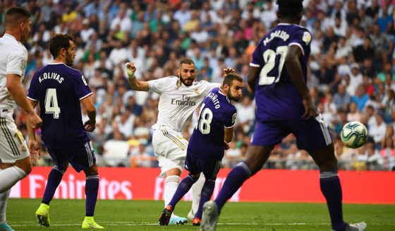 Real Madrid's French forward Karim Benzema (C) scored during the Spanish League football match between Real Madrid and Real Valladolid at the Santiago Bernabeu stadium in Madrid on August 24, 2019. (Photo by GABRIEL BOUYS / AFP) (Photo credit should read GABRIEL BOUYS/AFP/Getty Images)
