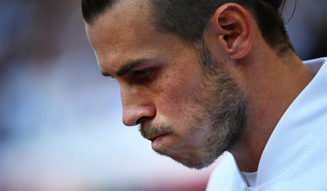 Real Madrid's Welsh forward Gareth Bale gestures before the Spanish League football match between Real Madrid and Real Valladolid at the Santiago Bernabeu stadium in Madrid on August 24, 2019. (Photo by GABRIEL BOUYS / AFP) (Photo credit should read GABRIEL BOUYS/AFP/Getty Images)