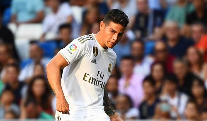 Valladolid's Spanish midfielder Fede San Emeterio (l) CHALLENGES Real Madrid's Colombian midfielder James Rodriguez during the Spanish League football match between Real Madrid and Real Valladolid at the Santiago Bernabeu stadium in Madrid on August 24, 2019. (Photo by GABRIEL BOUYS / AFP) (Photo credit should read GABRIEL BOUYS/AFP/Getty Images)