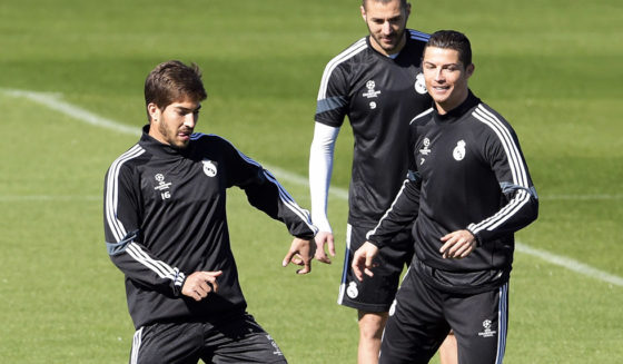 (L to R) Real Madrid's Brazilian midfielder Lucas Silva, Real Madrid's French forward Karim Benzema, Real Madrid's Portuguese forward Cristiano Ronaldo and French defender Raphael Varane take part in a training session at Valdebebas training ground in Madrid on March 9, 2015, on the eve of the UEFA Champions League football match Real Madrid CF vs FC Schalke 04. AFP PHOTO / GERARD JULIEN (Photo credit should read GERARD JULIEN/AFP/Getty Images)