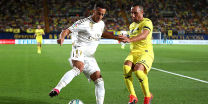 VILLAREAL, SPAIN - SEPTEMBER 01: Lucas Vazquez of Real Madrid is closed down by Santi Cazorla of Villarreal during the Liga match between Villarreal CF and Real Madrid CF at Estadio de la Ceramica on September 01, 2019 in Villareal, Spain. (Photo by David Ramos/Getty Images)