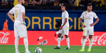 (FromL) Real Madrid's French forward Karim Benzema, Real Madrid's French defender Raphael Varane and Real Madrid's Brazilian midfielder Casemiro react after Villarreal's Spanish midfielder Moises Gomez scored a goal during the Spanish league football match Villarreal CF against Real Madrid CF at La Ceramica stadium in Vila-real on September 1, 2019. (Photo by Josep LAGO / AFP) (Photo credit should read JOSEP LAGO/AFP/Getty Images)