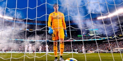 Real Madrid's Belgian goalkeeper Thibaut Courtois takes the ball after failing to save a goal during the 2019 International Champions Cup football match between Real Madrid and Atletico Madrid at the Metlife Stadium Arena in East Rutherford, New Jersey on July 26, 2019. (Photo by Johannes EISELE / AFP) (Photo credit should read
