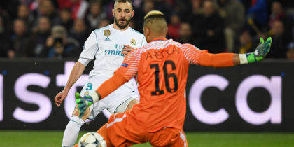 PARIS, FRANCE - MARCH 06: Karim Benzema of Real Madrid shoots past Alphonse Areola of PSG, but misses during the UEFA Champions League Round of 16 Second Leg match between Paris Saint-Germain and Real Madrid at Parc des Princes on March 6, 2018 in Paris, France. (Photo by Matthias Hangst/Getty Images)