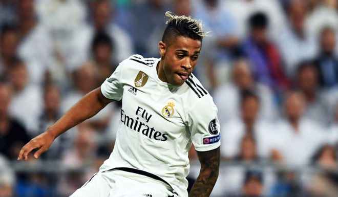 Real Madrid's Spanish-Dominican forward Mariano (L) vies with Roma's Argentinian defender Federico Fazio during the UEFA Champions League group G football match between Real Madrid CF and AS Roma at the Santiago Bernabeu stadium in Madrid on September 19, 2018. (Photo by GABRIEL BOUYS / AFP) (Photo credit should read GABRIEL BOUYS/AFP/Getty Images)
