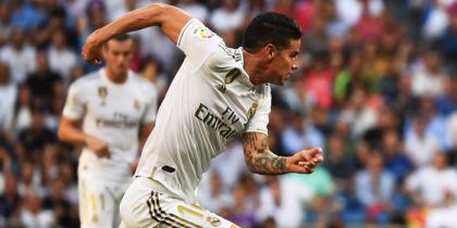 Real Madrid's Colombian midfielder James Rodriguez (L) challenges Valladolid's Spanish midfielder Oscar Plano (R) during the Spanish League football match between Real Madrid and Real Valladolid at the Santiago Bernabeu stadium in Madrid on August 24, 2019. (Photo by GABRIEL BOUYS / AFP) (Photo credit should read GABRIEL BOUYS/AFP/Getty Images)