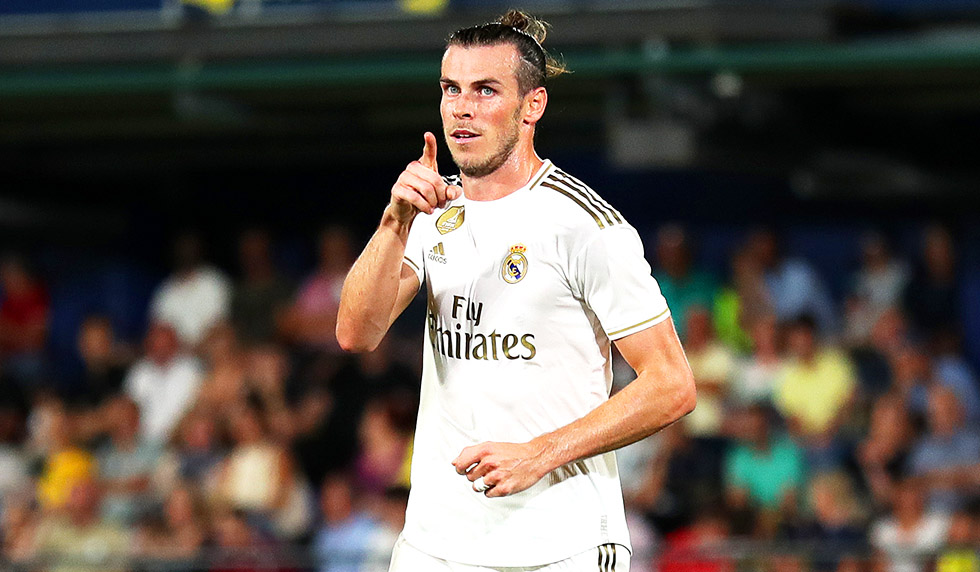 VILLAREAL, SPAIN - SEPTEMBER 01: Gareth Bale of Real Madrid celebrates after scoring his sides first goal during the Liga match between Villarreal CF and Real Madrid CF at Estadio de la Ceramica on September 01, 2019 in Villareal, Spain. (Photo by David Ramos/Getty Images)