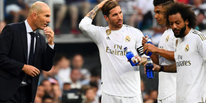 Real Madrid's French coach Zinedine Zidane (L) talks to Real Madrid's Spanish defender Sergio Ramos, Real Madrid's Brazilian midfielder Casemiro and Real Madrid's Brazilian defender Marcelo during the Spanish League football match between Real Madrid and Real Valladolid at the Santiago Bernabeu stadium in Madrid on August 24, 2019. (Photo by GABRIEL BOUYS / AFP) (Photo credit should read GABRIEL BOUYS/AFP/Getty Images)
