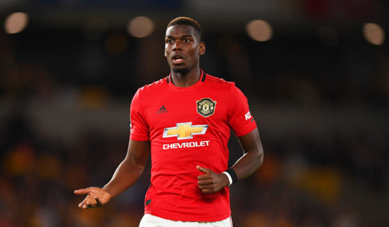 Paul Pogba WOLVERHAMPTON, ENGLAND - AUGUST 19: Paul Pogba of Manchester United during the Premier League match between Wolverhampton Wanderers and Manchester United at Molineux on August 19, 2019 in Wolverhampton, United Kingdom. (Photo by Shaun Botterill/Getty Images)
