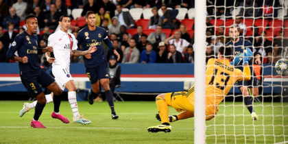 Paris Saint-Germain's Argentine midfielder Angel Di Maria scores his team's first goal during the UEFA Champions league Group A football match between Paris Saint-Germain and Real Madrid, at the Parc des Princes stadium, in Paris, on September 18, 2019. (Photo by Lucas BARIOULET / AFP) (Photo credit should read LUCAS BARIOULET/AFP/Getty Images)