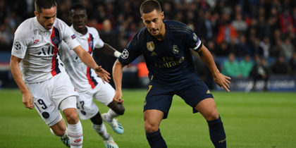 Real Madrid's Belgian forward Eden Hazard (R) fights for the ball with Paris Saint-Germain's Spanish midfielder Pablo Sarabia during the UEFA Champions league Group A football match between Paris Saint-Germain and Real Madrid, at the Parc des Princes stadium, in Paris, on September 18, 2019. (Photo by MARTIN BUREAU / AFP) (Photo credit should read MARTIN BUREAU/AFP/Getty Images)