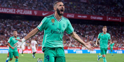 SEVILLE, SPAIN - SEPTEMBER 22: Karim Benzema of Real Madrid CF celebrates after scoring a goal during the Liga match between Sevilla FC and Real Madrid CF at Estadio Ramon Sanchez Pizjuan on September 22, 2019 in Seville, Spain. (Photo by Aitor Alcalde/Getty Images)