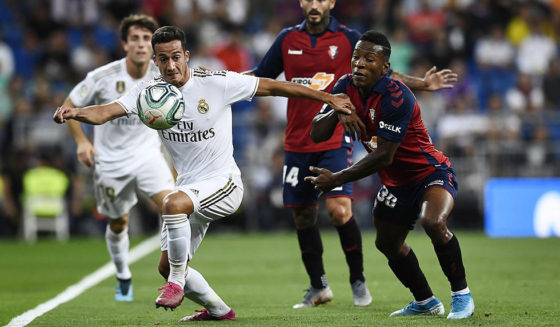 Real Madrid's Spanish forward Lucas Vazquez (L) vies with Osasuna's Ecuadorean defender Pervis Estupinan during the Spanish league football match between Real Madrid CF and CA Osasuna at the Santiago Bernabeu stadium in Madrid, on September 25, 2019. (Photo by OSCAR DEL POZO / AFP) (Photo credit should read OSCAR DEL POZO/AFP/Getty Images)