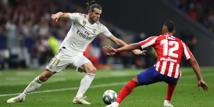 MADRID, SPAIN - SEPTEMBER 28: Gareth Bale of Real Madrid battles for the ball with Renan Lodi of Atletico Madrid during the Liga match between Club Atletico de Madrid and Real Madrid CF at Wanda Metropolitano on September 28, 2019 in Madrid, Spain. (Photo by Angel Martinez/Getty Images)