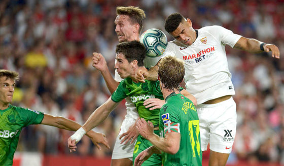 Sevilla's Brazilian defender Diego Carlos (L) jumps for the ball with Real Sociedad's Spanish defender Aritz Elustondo (L) during the Spanish league football match between Sevilla FC and Real Sociedad at the Ramon Sanchez Pizjuan stadium in Seville on September 29, 2019. (Photo by CRISTINA QUICLER / AFP) (Photo credit should read CRISTINA QUICLER/AFP/Getty Images)