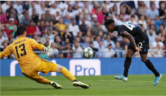 Emmanuel Dennis Emmanuel Bonaventure Dennis of Club Brugge scores his team's second goal during the UEFA Champions League group A match between Real Madrid and Club Brugge KV at Bernabeu on October 01, 2019 in Madrid, Spain. (Photo by Gonzalo Arroyo Moreno/Getty Images)