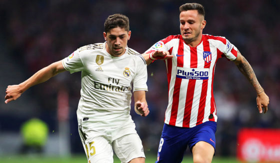 MADRID, SPAIN - SEPTEMBER 28: Federico Valverde of Real Madrid battles for the ball with Saul of Atletico Madrid during the Liga match between Club Atletico de Madrid and Real Madrid CF at Wanda Metropolitano on September 28, 2019 in Madrid, Spain. (Photo by Angel Martinez/Getty Images)