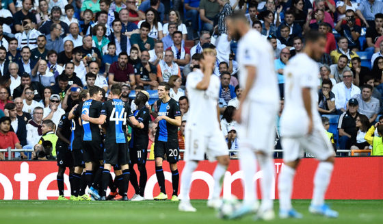 Club Brugge's players celebrate after Nigerian forward Emmanuel Bonaventure scored a second goal during the UEFA Champions league Group A football match between Real Madrid and Club Brugge at the Santiago Bernabeu stadium in Madrid on October 1, 2019. (Photo by OSCAR DEL POZO / AFP) (Photo credit should read OSCAR DEL POZO/AFP/Getty Images)