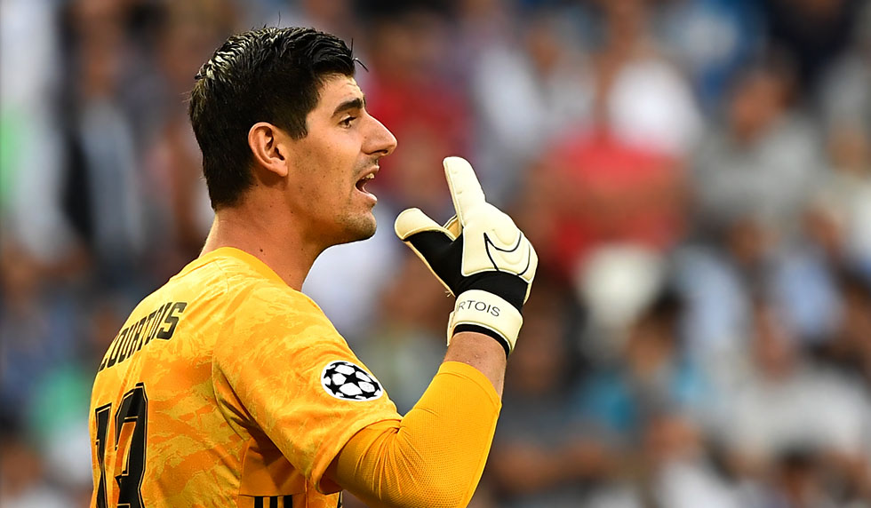 Real Madrid's Belgian goalkeeper Thibaut Courtois reacts during the UEFA Champions league Group A football match between Real Madrid and Club Brugge at the Santiago Bernabeu stadium in Madrid on October 1, 2019. (Photo by PIERRE-PHILIPPE MARCOU / AFP) (Photo credit should read PIERRE-PHILIPPE MARCOU/AFP/Getty Images)