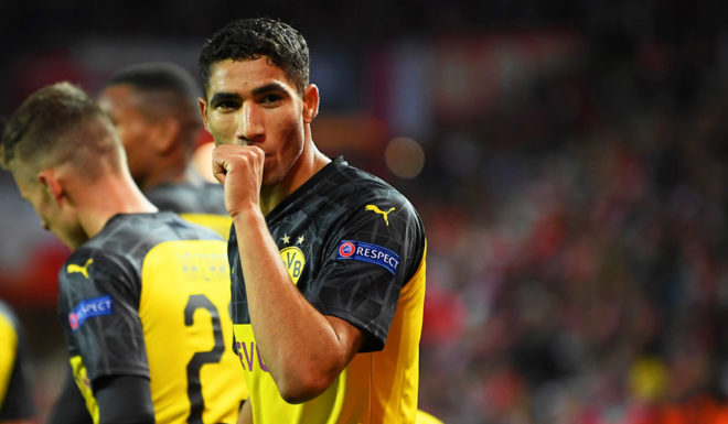 Achraf Hakimi PRAGUE, CZECH REPUBLIC - OCTOBER 02: Achraf Hakimi of Borussia Dortmund celebrates scoring his team's second goal during the UEFA Champions League group F match between Slavia Praha and Borussia Dortmund at Eden Stadium on October 02, 2019 in Prague, Czech Republic. (Photo by Sebastian Widmann/Getty Images)