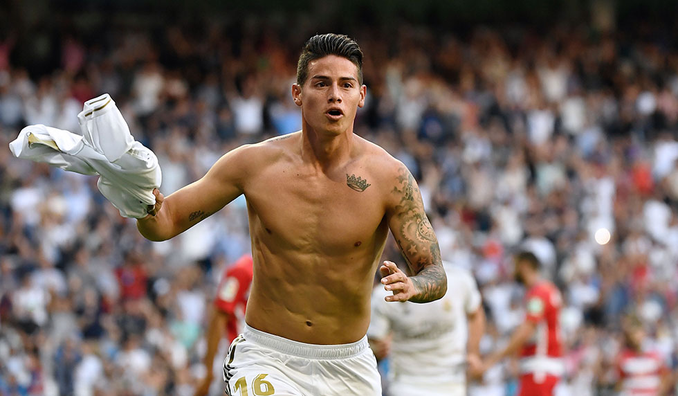 Real Madrid's Colombian midfielder James Rodriguez celebrates scoring his team's fourth goal during the Spanish league football match between Real Madrid CF and Granada FC at the Santiago Bernabeu stadium in Madrid on October 5, 2019. (Photo by PIERRE-PHILIPPE MARCOU / AFP) (Photo by PIERRE-PHILIPPE MARCOU/AFP via Getty Images)