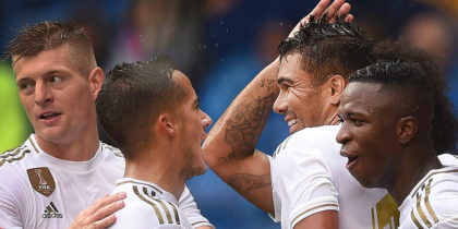 MADRID, SPAIN - SEPTEMBER 14: Henrique Casemiro of Real Madrid celebrates with Toni Kroos, Lucas Vazquez and Vinicius Junior after scoring his team's third goal during the La Liga match between Real Madrid CF and Levante UD at Estadio Santiago Bernabeu on September 14, 2019 in Madrid, Spain. (Photo by Denis Doyle/Getty Images)
