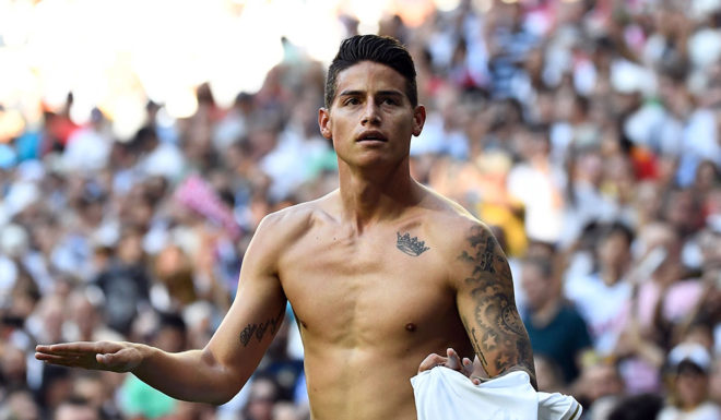 Real Madrid's Colombian midfielder James Rodriguez celebrates scoring his team's fourth goal during the Spanish league football match between Real Madrid CF and Granada FC at the Santiago Bernabeu stadium in Madrid on October 5, 2019. (Photo by PIERRE-PHILIPPE MARCOU / AFP) (Photo by PIERRE-PHILIPPE MARCOU/AFP via Getty Images)