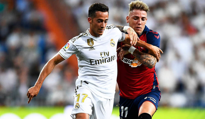 Real Madrid's Spanish forward Lucas Vazquez (L) vies with Osasuna's Spanish forward Brandon Llamas during the Spanish league football match between Real Madrid CF and CA Osasuna at the Santiago Bernabeu stadium in Madrid, on September 25, 2019. (Photo by OSCAR DEL POZO / AFP) (Photo credit should read OSCAR DEL POZO/AFP/Getty Images)