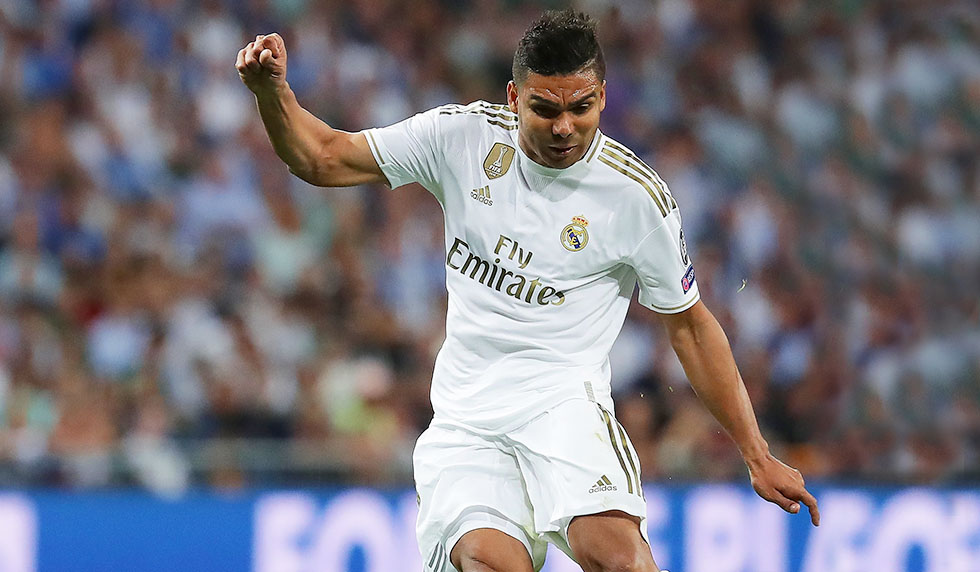 MADRID, SPAIN - OCTOBER 01: Carlos Casemiro of Real Madrid CF strikes the ball during the UEFA Champions League group A match between Real Madrid and Club Brugge KV at Bernabeu on October 01, 2019 in Madrid, Spain. (Photo by Gonzalo Arroyo Moreno/Getty Images)