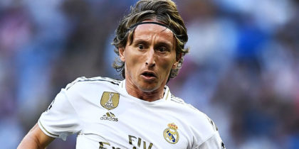 Real Madrid's Croatian midfielder Luka Modric eyes the ball during the UEFA Champions league Group A football match between Real Madrid and Club Brugge at the Santiago Bernabeu stadium in Madrid on October 1, 2019. (Photo by OSCAR DEL POZO / AFP) (Photo credit should read OSCAR DEL POZO/AFP/Getty Images)