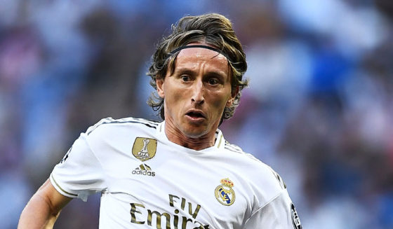 Real Madrid's Croatian midfielder Luka Modric eyes the ball during the UEFA Champions league Group A football match between Real Madrid and Club Brugge at the Santiago Bernabeu stadium in Madrid on October 1, 2019. (Photo by OSCAR DEL POZO / AFP) (Photo credit should read OSCAR DEL POZO/AFP/Getty Images)