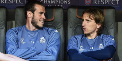 (L-R) Real Madrid's Welsh striker Gareth Bale, Real Madrid's Croatian Luka Modric and Brazilian defender Danilo wait at the bench prior to a training session on the eve of the UEFA Champions League quarter-final football match between FC Bayern Munich and Real Madrid in Munich, southern Germany, on April 11, 2017. / AFP PHOTO / Christof STACHE (Photo credit should read CHRISTOF STACHE/AFP/Getty Images)