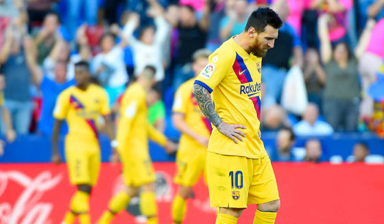 Barcelona's Argentinian Forward Lionel Messi reacts to Levante's goal looking downwards during the Spanish League football match between Levante UD and FC Barcelona at the Ciutat de Valencia stadium in Valencia, on November 2, 2019. (Photo by JOSE JORDAN / AFP) (Photo by JOSE JORDAN/AFP via Getty Images)